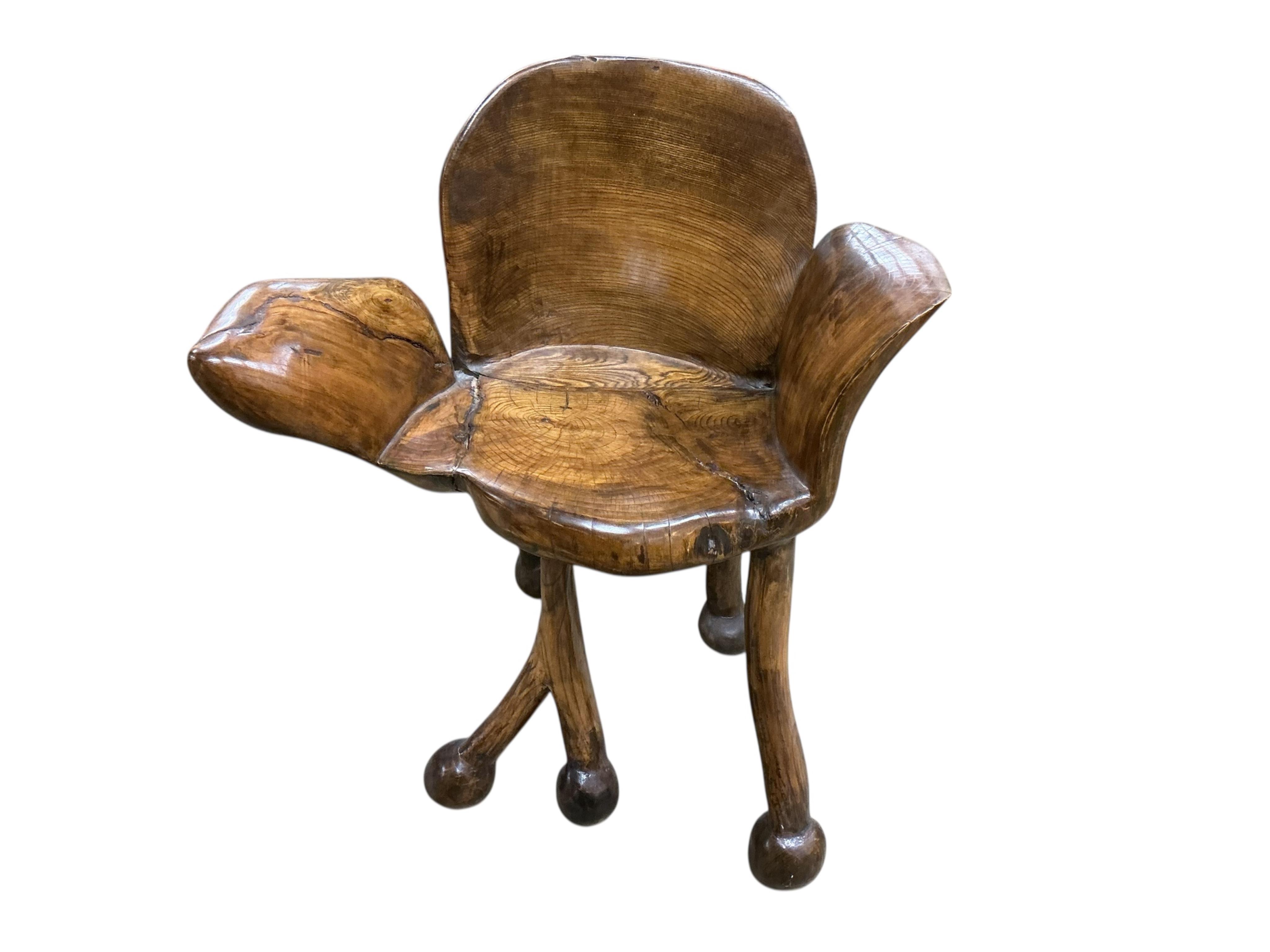 Pierre Decorse (b.1953), a naturalistically modelled elbow chair raised on irregular legs, width 68cm, depth 41cm, height 75cm